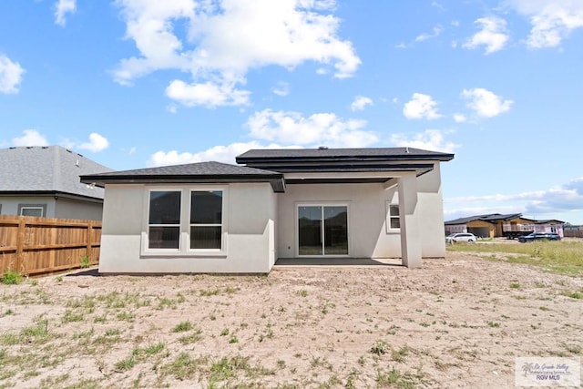 back of property featuring a patio area