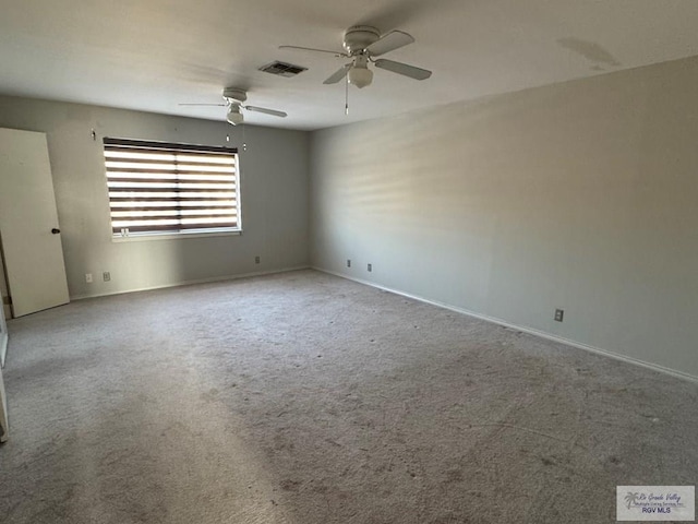 unfurnished room featuring ceiling fan and light colored carpet