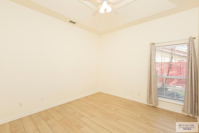 unfurnished room with ceiling fan and light hardwood / wood-style flooring