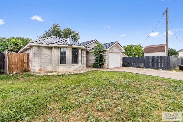 4217 W Ithaca Ave, Mcallen, TX 78501 - ranch-style house featuring driveway, an attached garage, and metal roof