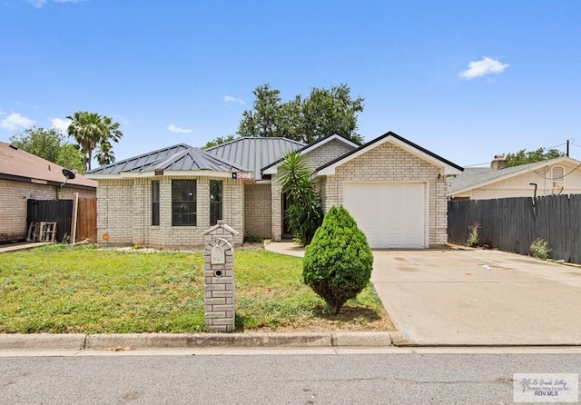 4217 W Ithaca Ave, Mcallen, TX 78501 - ranch-style home featuring an attached garage, driveway, and brick siding