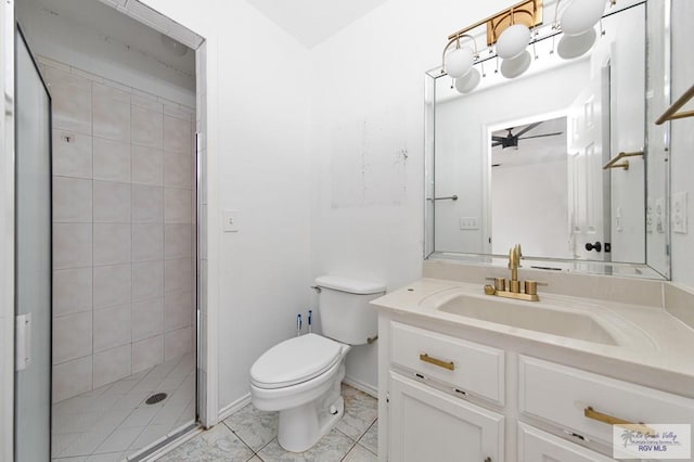4217 W Ithaca Ave, Mcallen, TX 78501 - bathroom with toilet, vanity, a stall shower, and a ceiling fan