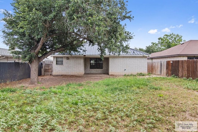 4217 W Ithaca Ave, Mcallen, TX 78501 - rear view of property with brick siding