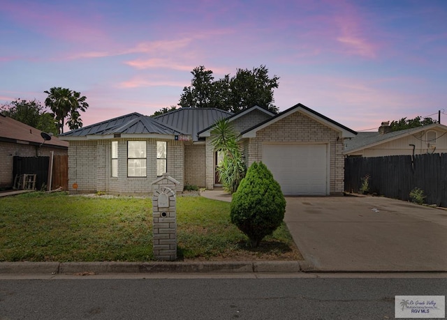 4217 W Ithaca Ave, Mcallen, TX 78501 - ranch-style house featuring an attached garage and driveway