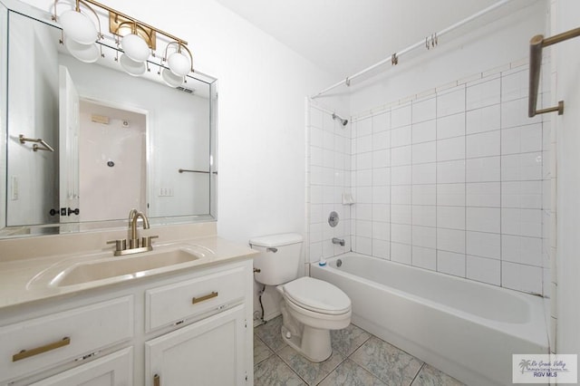 4217 W Ithaca Ave, Mcallen, TX 78501 - bathroom with toilet, vanity, shower / tub combination, and tile patterned flooring