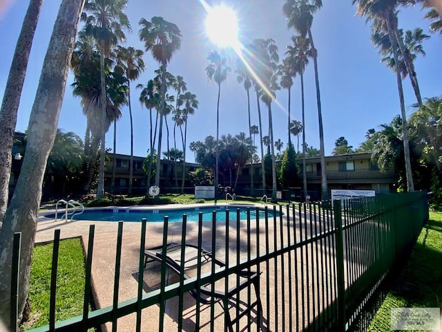 community pool with fence