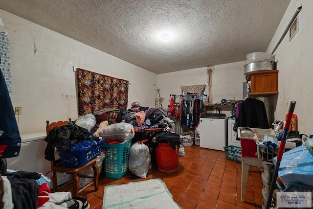 storage area featuring washer and dryer