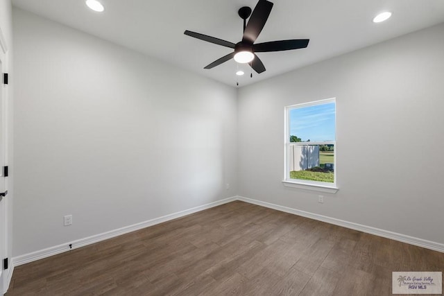 unfurnished room featuring hardwood / wood-style floors and ceiling fan