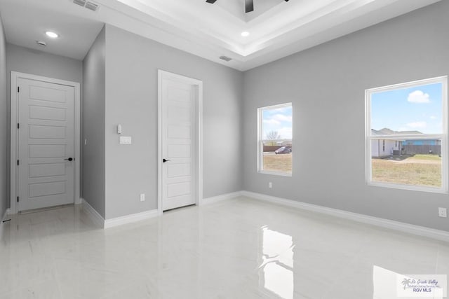 unfurnished bedroom with visible vents, baseboards, recessed lighting, and a ceiling fan