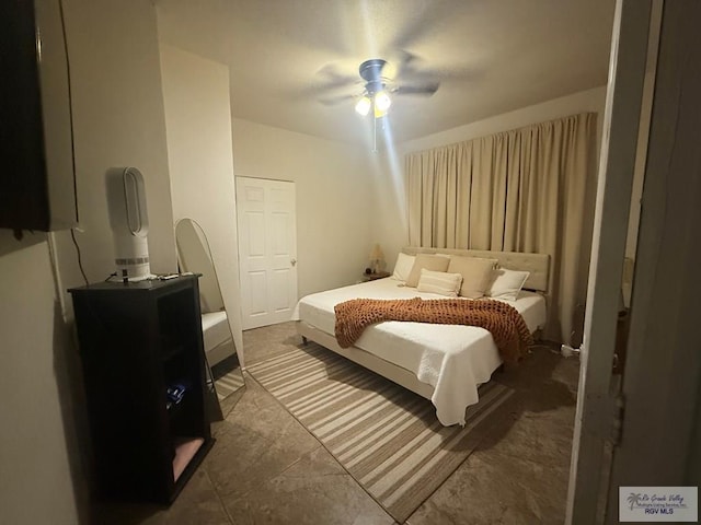 bedroom featuring a ceiling fan