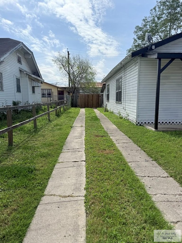 view of yard with fence