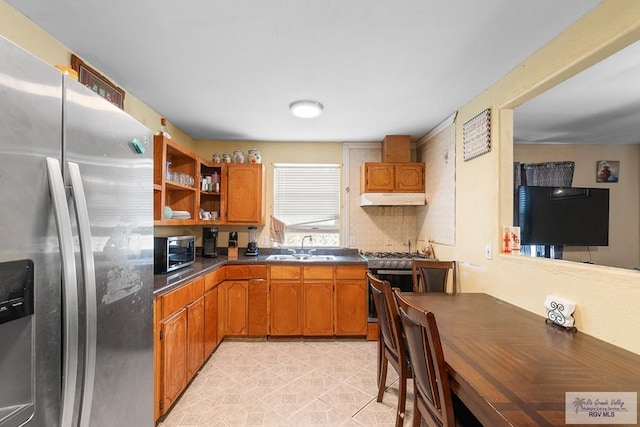 kitchen with sink and appliances with stainless steel finishes