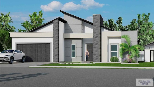 contemporary home featuring concrete driveway, a garage, and stucco siding