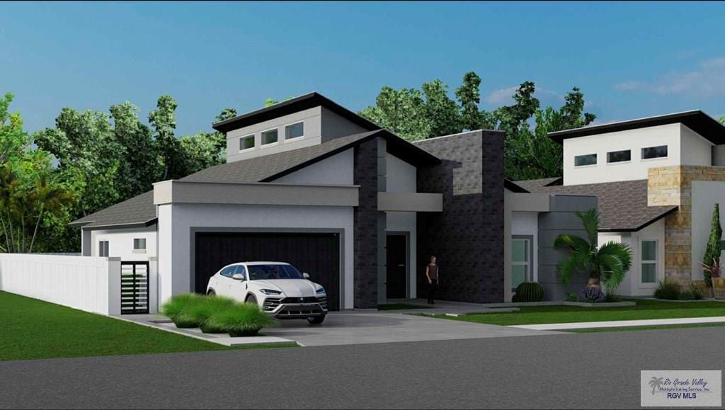 modern home with a garage and a front lawn