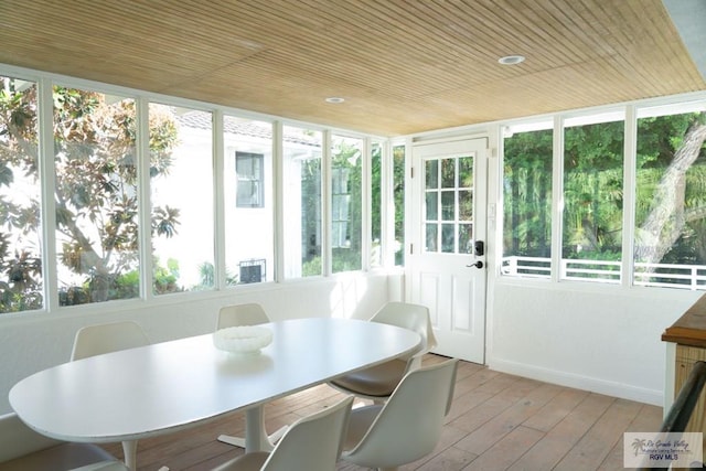 sunroom / solarium featuring a wealth of natural light