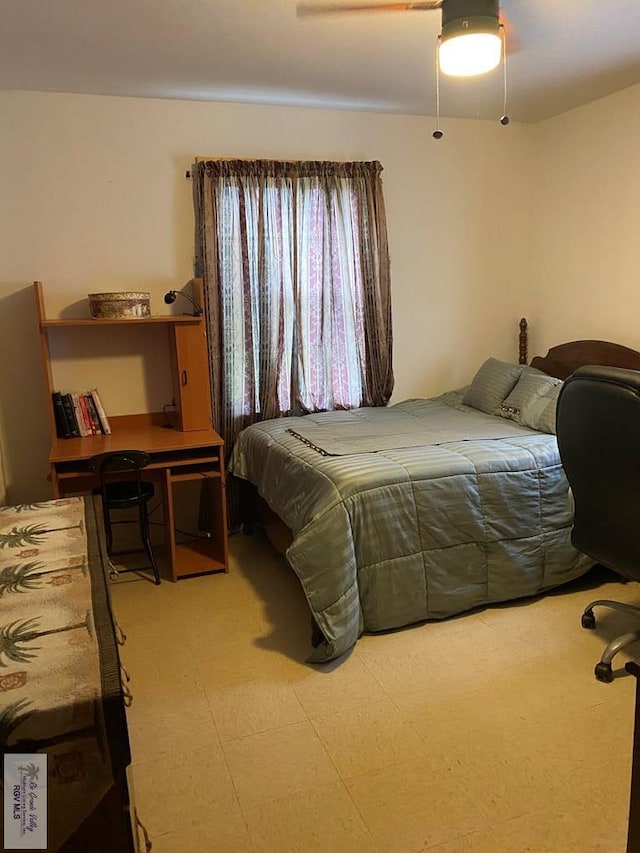 bedroom featuring ceiling fan