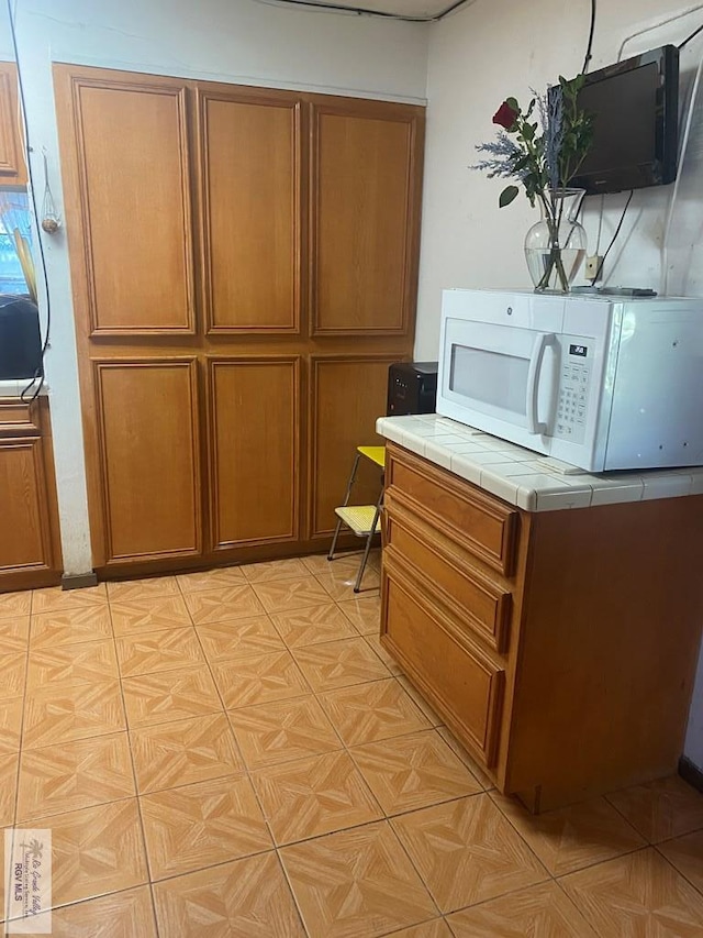 kitchen with tile countertops