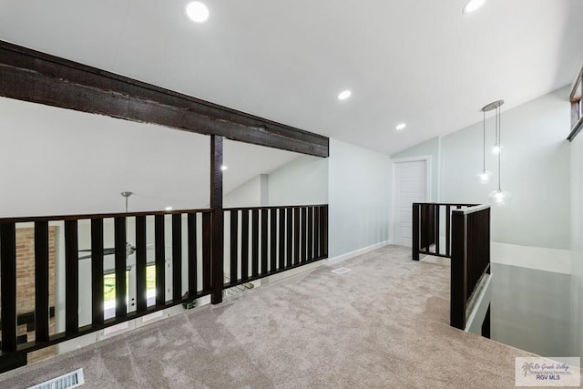 basement featuring baseboards, recessed lighting, visible vents, and light colored carpet