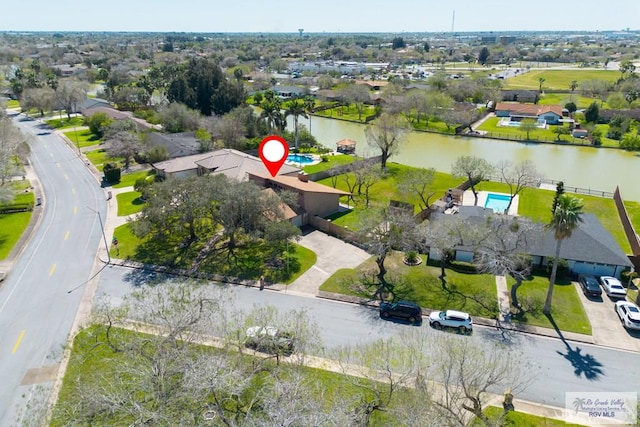 aerial view featuring a water view and a residential view