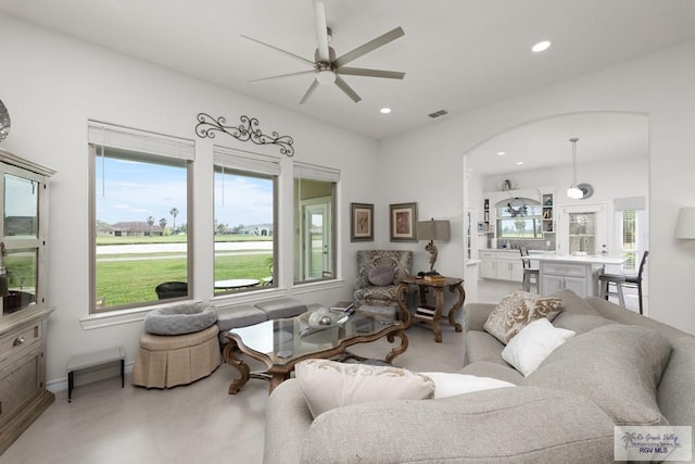 living room featuring ceiling fan