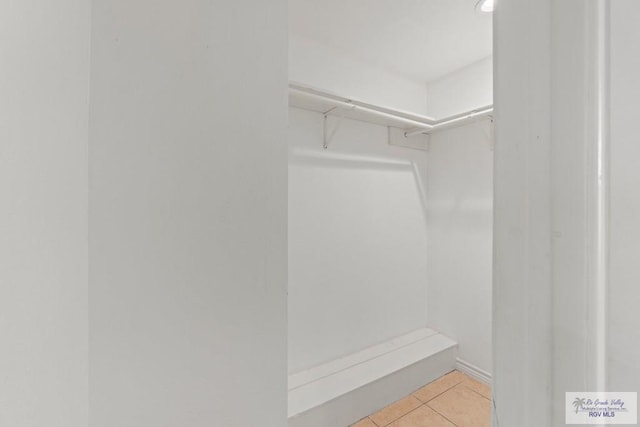 1000 E Palm Valley Dr, Palm Valley, TX 78552 - spacious closet featuring light tile patterned floors
