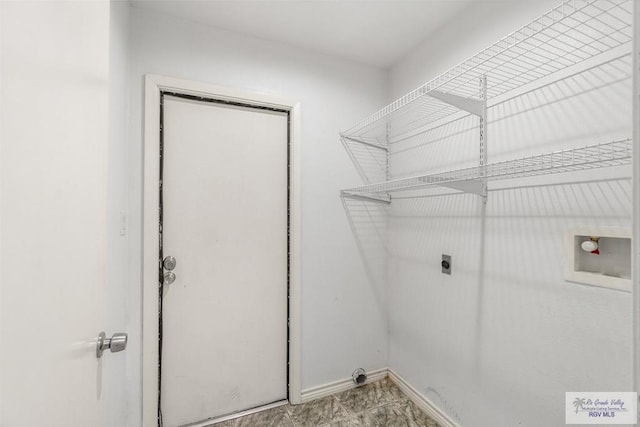 1000 E Palm Valley Dr, Palm Valley, TX 78552 - laundry area featuring hookup for an electric dryer and washer hookup