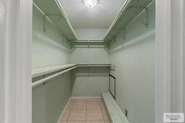 1000 E Palm Valley Dr, Palm Valley, TX 78552 - walk in closet featuring light tile patterned floors