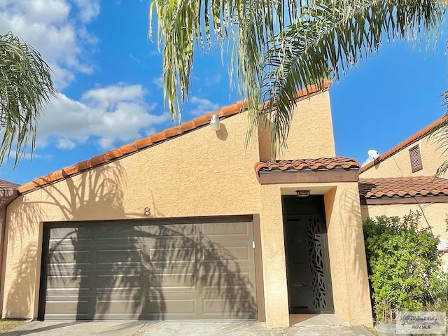 view of front of house with a garage