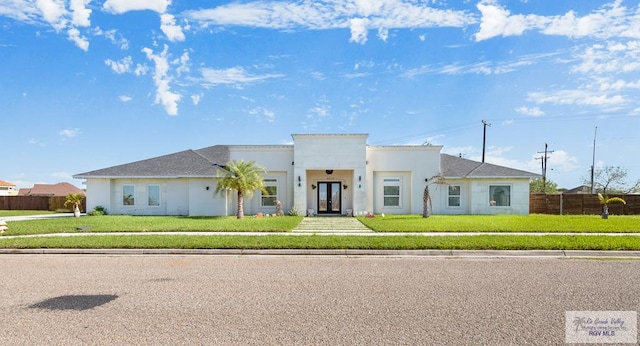 view of front of home with a front yard