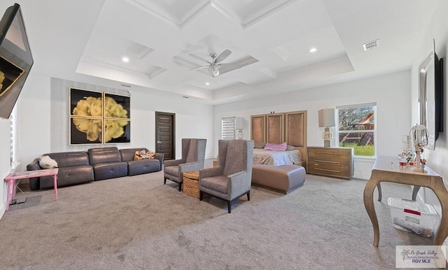 carpeted bedroom with ceiling fan, beam ceiling, and coffered ceiling