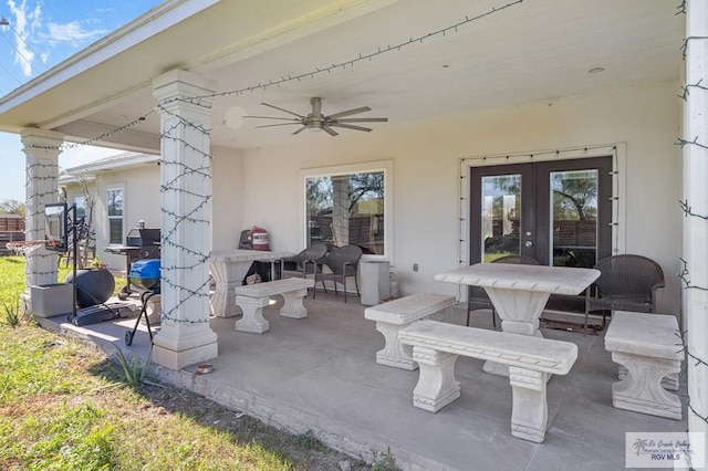 view of patio / terrace featuring ceiling fan