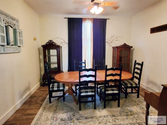 dining room featuring hardwood / wood-style flooring and ceiling fan