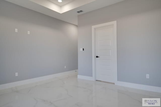 spare room featuring recessed lighting, visible vents, baseboards, and marble finish floor