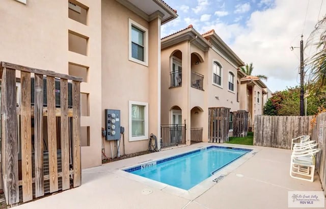 view of pool with a patio