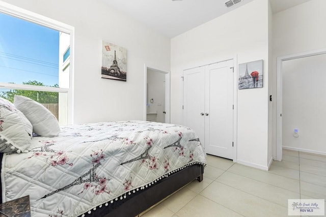 1749 Vincent St, Donna, TX 78537 - tiled bedroom with baseboards, visible vents, and a closet