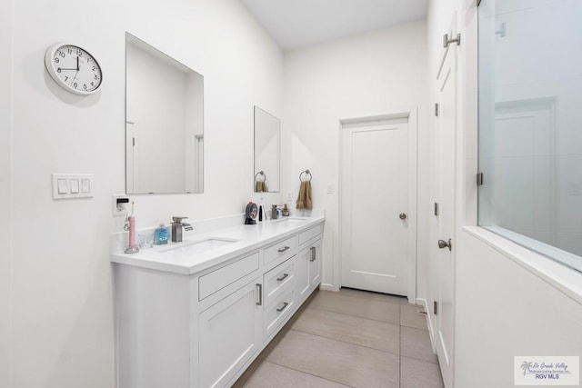 1749 Vincent St, Donna, TX 78537 - full bath featuring a shower, tile patterned flooring, a sink, and double vanity