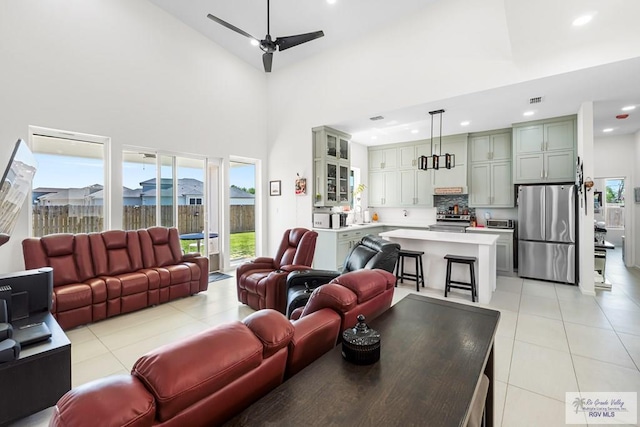 1749 Vincent St, Donna, TX 78537 - living area featuring recessed lighting, a high ceiling, visible vents, a ceiling fan, and light tile patterned flooring