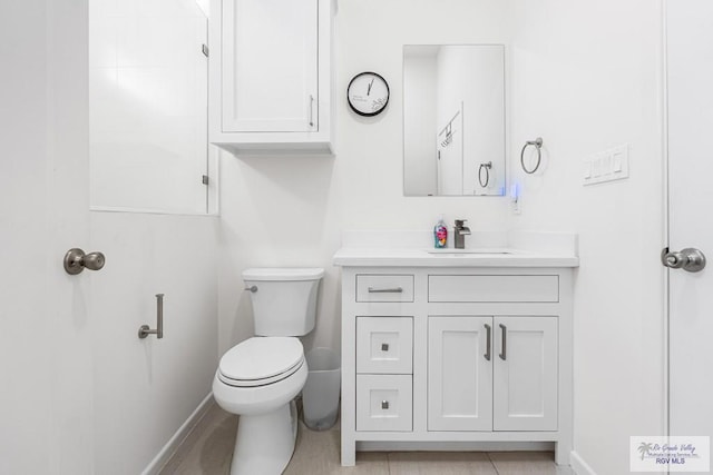 1749 Vincent St, Donna, TX 78537 - bathroom featuring baseboards, toilet, and vanity