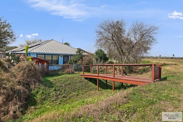 view of yard with a wooden deck