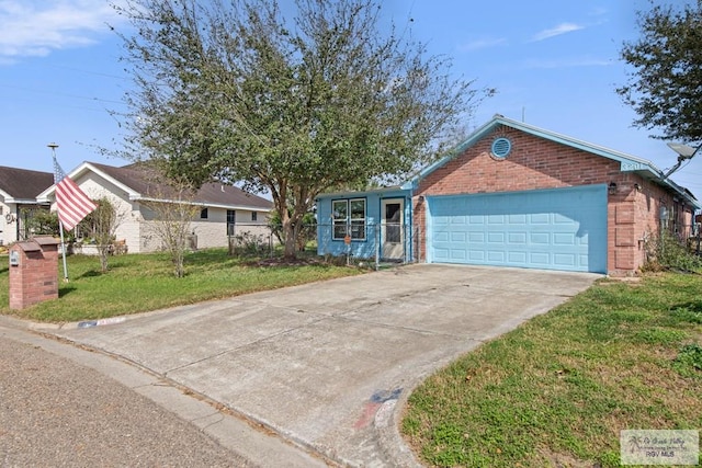 ranch-style house with driveway, fence, a front yard, a garage, and brick siding