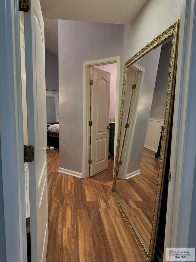 hallway featuring dark hardwood / wood-style floors