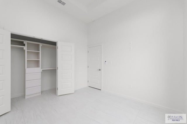 8879 Wentz Lk, Brownsville, TX 78520 - unfurnished bedroom featuring a closet and baseboards