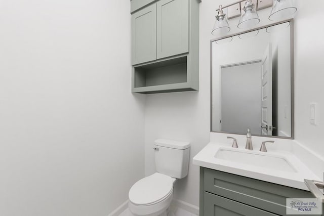 8879 Wentz Lk, Brownsville, TX 78520 - half bathroom featuring toilet and vanity