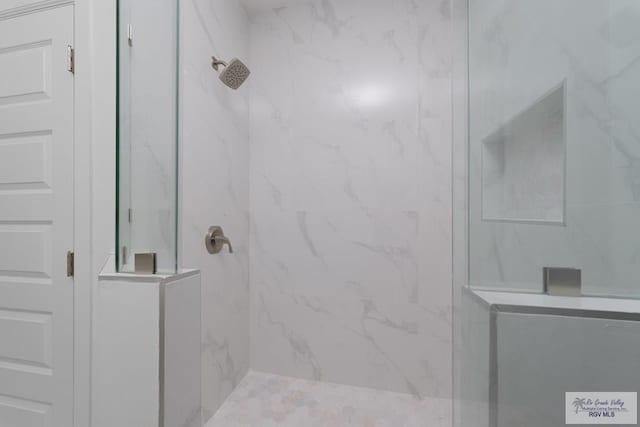 8879 Wentz Lk, Brownsville, TX 78520 - bathroom featuring a marble finish shower