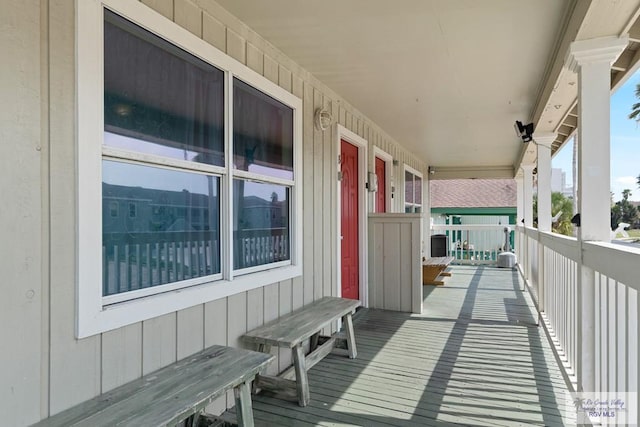 balcony featuring covered porch