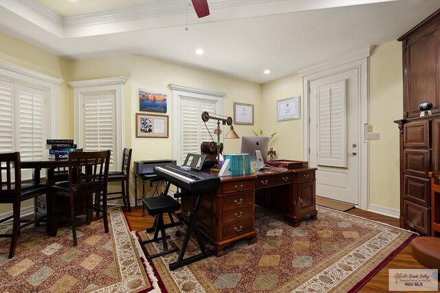 office space with hardwood / wood-style flooring, ceiling fan, and ornamental molding