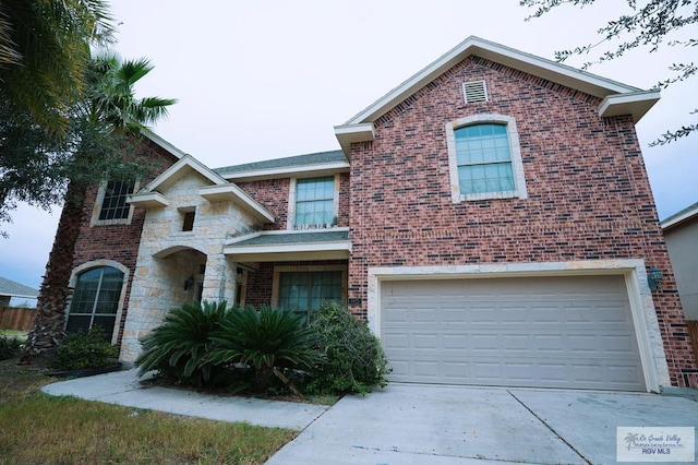 view of front of home with a garage