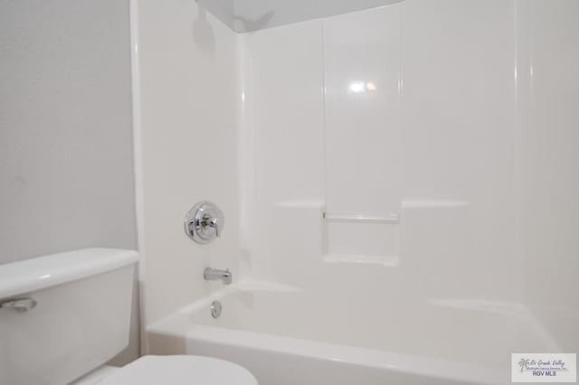 6724 Pino Verde Dr, Brownsville, TX 78526 - bathroom featuring toilet and shower / bathing tub combination