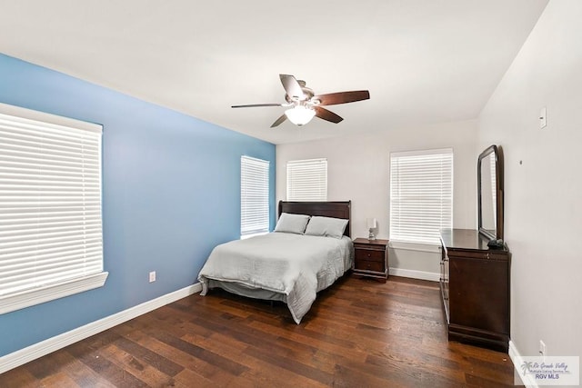 bedroom featuring dark hardwood / wood-style flooring and ceiling fan