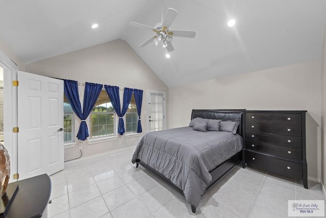 bedroom with light tile patterned floors, vaulted ceiling, and ceiling fan